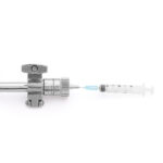 Top view of Aerre Inox RPS sampling valve connected to syringe for sterile sampling from process line